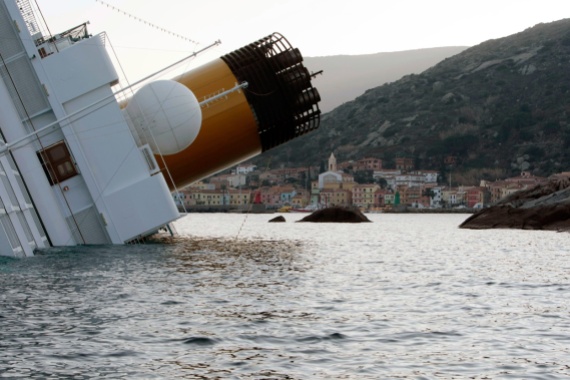 The Costa Concordia leans on its side after running aground, on January 14, 2012. (AP Photo/Gregorio Borgia)