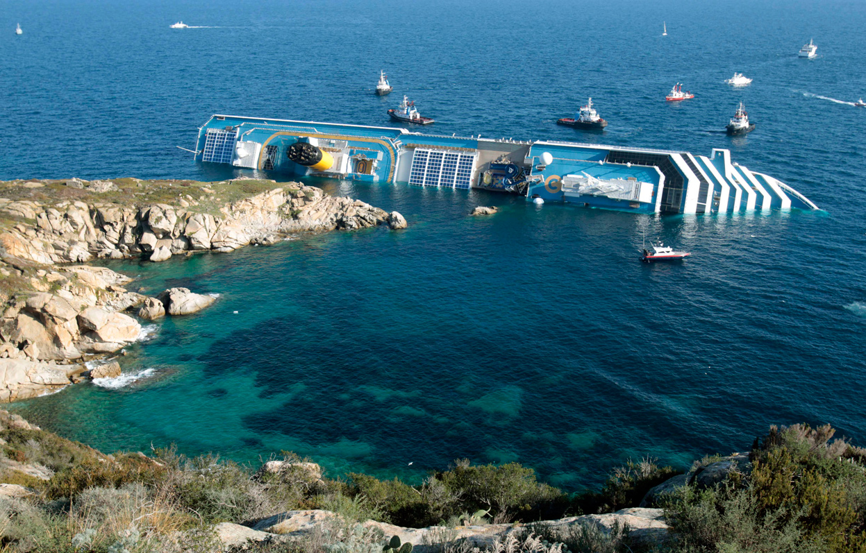 https://llwproductions.files.wordpress.com/2012/01/costa-concordia-surrounded-by-boats.jpg