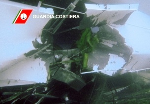 A breach is seen on the body of the cruise ship Costa Concordia in this underwater photo released by the Italian Coast Guard on January 16, 2012. (AP Photo/Italian Coast Guard)