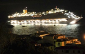 The luxury cruise ship Costa Concordia leans after it ran aground off the coast of the Isola del Giglio island, Italy, early Saturday, January 14, 2012. (AP Photo/Giglionews.it, Giorgio Fanciulli)
