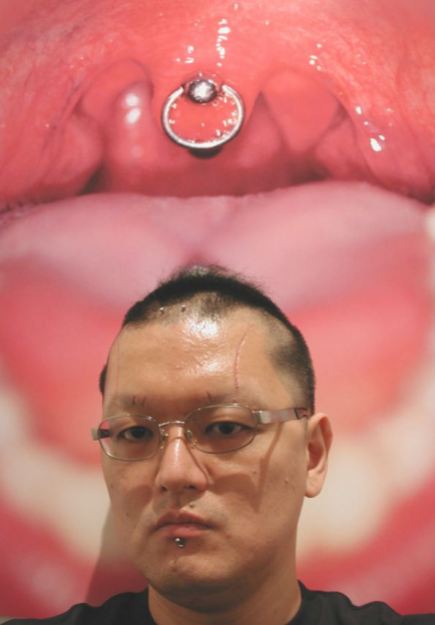 Pierced thing in mouth body modification Japan 1
