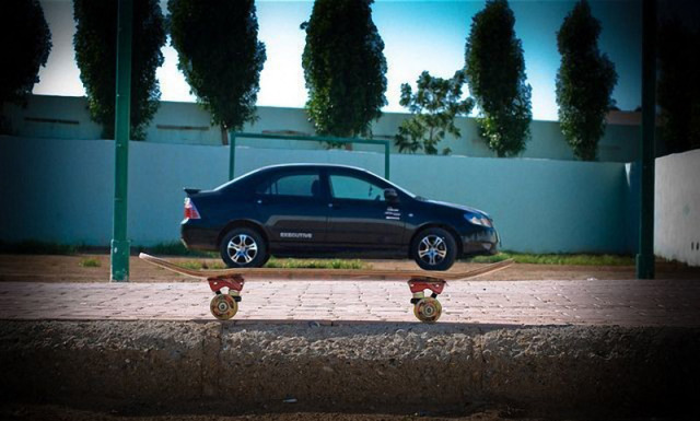 optical illusions car on top of skateboard