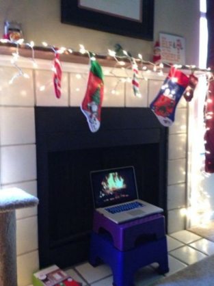 Laptop used for a fireplace roaring fire.